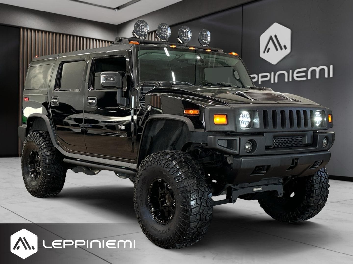 Hummer H2 6.0 Vortec 4x4 Facelift, vuosimalli 2007, musta — kuva 1/13
