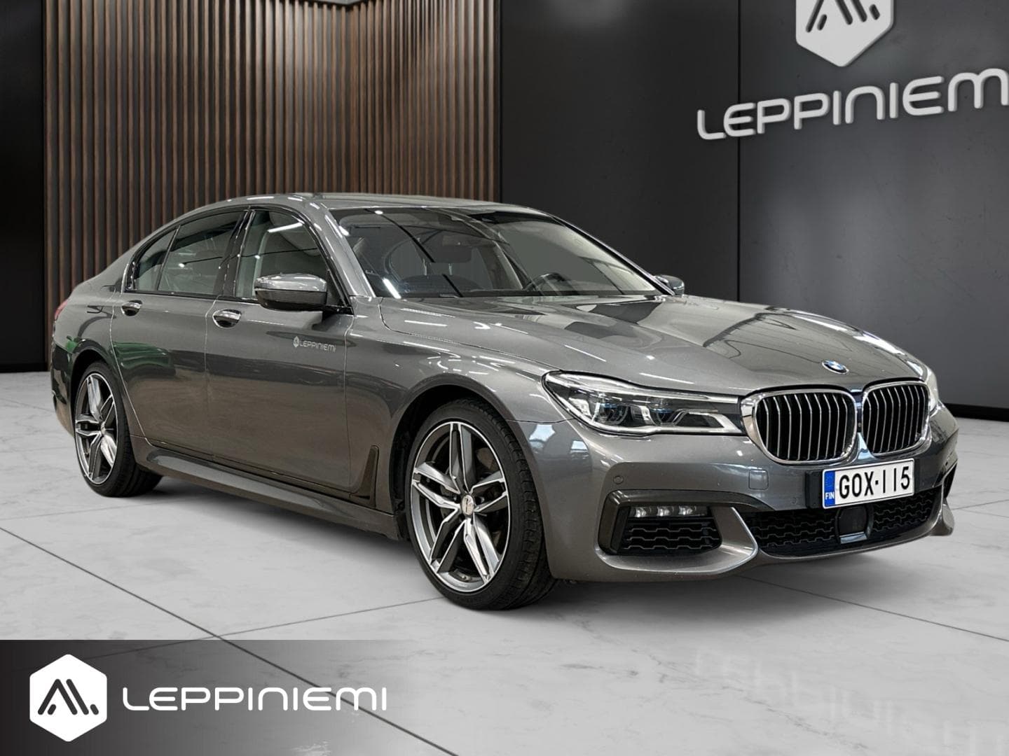 BMW 750 G11 dA xDrive 400hv M-Sport Shadowline, vuosimalli 2019, harmaa
